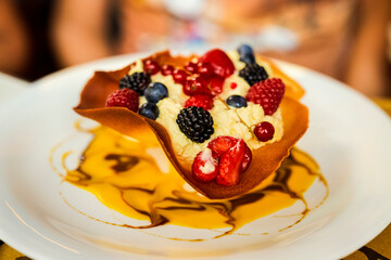 ice cream with fruits in cone