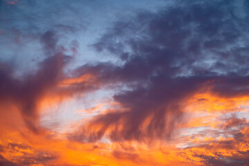 Beautiful epic orange dark blue sunset sky