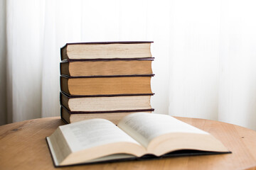 Pile of hardcover books