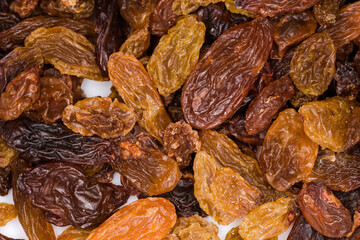 Dark yellow raisins, top view close-up