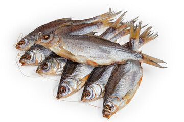 Heap of salted and dried roach on white background