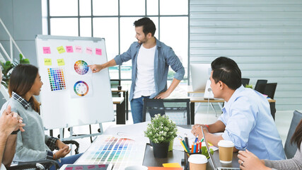 Diversity multiethnic team group of business people Present meeting conference room brainstorming business graph, chart. Multicultural Teamwork collaborate business team meeting together trust partner