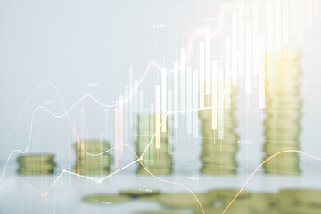 Abstract virtual financial graph hologram on coins background, financial and trading concept. Multiexposure
