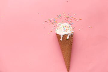 top view of ice cream with scoop on pink background,