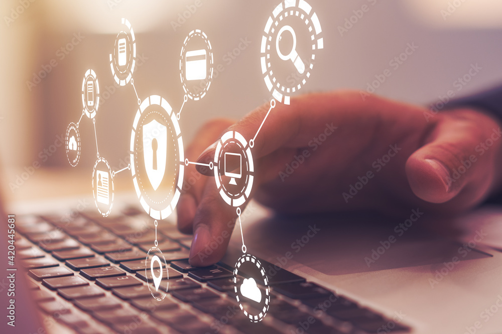 Poster Cyber network security concept with digital screen of security icons and symbols and man hand with laptop