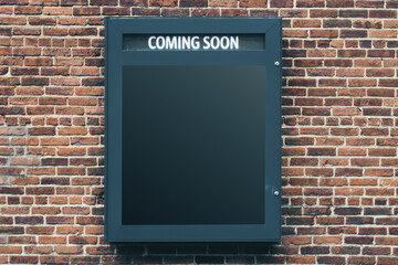Blank black poster coming soon on old brick wall