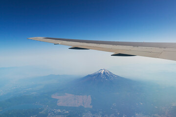 Airplane over Fuji mountain, Japan