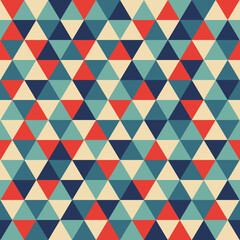 Retro geometric triangle seamless repeating background pattern in vector format. Mosaic of red, turquoise, teal, beige and navy blue.