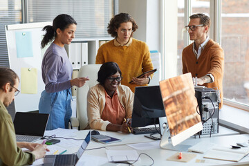 Creative Team of Software Developers Discussing Project