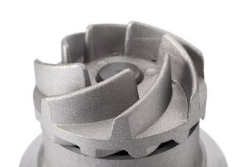 Vanes of water pump for car cooling system on white background, small depth of focus.