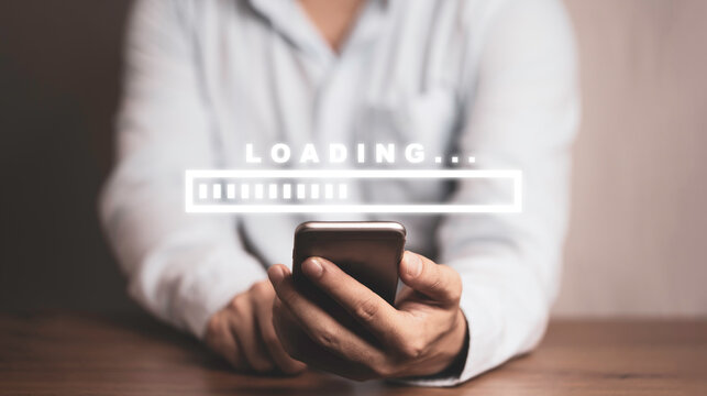 Businessman using smartphone for download and upload application and information, technology concept.