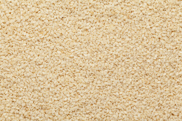 Close-up of Organic White  Sesame seeds(Sesamum indicum) polished or white Til without shell Full-Frame Background. Top View