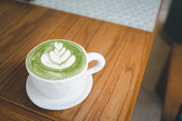 hot green tea latte with latte art