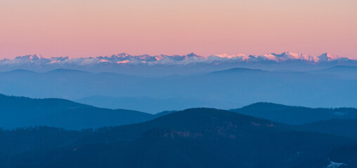 Tatra mountains from Lysa hora hill in Moravskoslezske Beskydy mountains in Czech republic during...