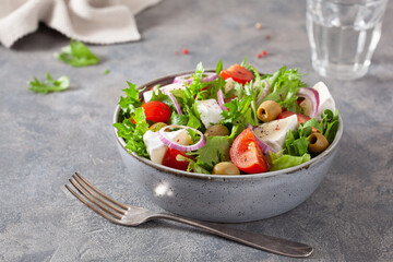 tomato salad with brie cheese olives onion lettuce
