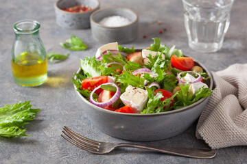 tomato salad with brie cheese olives onion lettuce