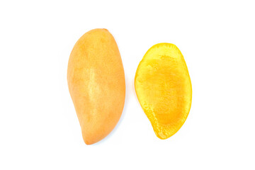 Fresh yellow mango One mango and cut in half. Separated from the white background That was taken from the top corner.