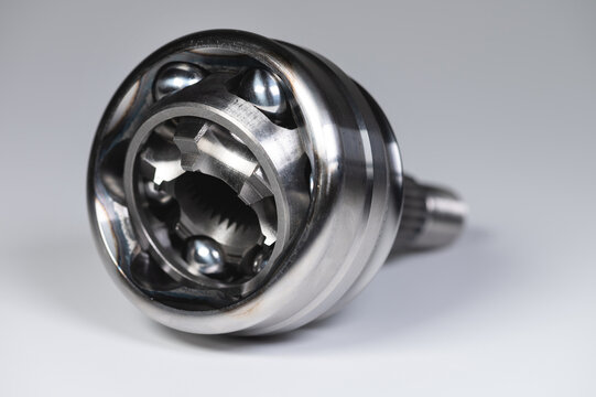 Close-up constant-velocity universal spheric joint new on gray background