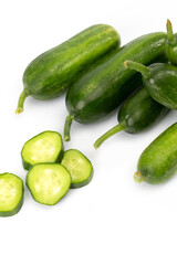 Small cucumbers on white background