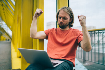 Successful boss enjoying achieving goal in pedestrian bridge