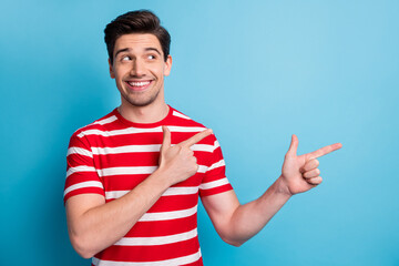 Photo portrait of man pointing fingers looking copyspace advising smiling in stylish outfit...