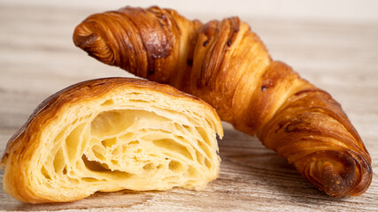 Perfect morning empty croissant. Croissants and other viennoiserie are made of a layered yeast-leavened dough