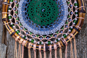 Handmade dream catcher with feathers threads and beads rope hanging