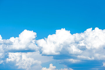 Clouds on blue azure sky bright daytime summer. Everything lies above surface atmosphere outer space is sky.