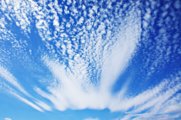 Beautiful cloudy blue sky with white cirrus clouds, natural background, copy space, selective focus, wallpaper, cloudscape