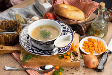 Vegetable vegetarian soup with mushrooms carrots and dill