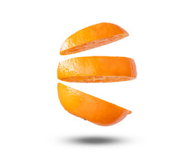 Fototapeta na wymiar Flying orange. Sliced orange isolated on white background. Levity fruit floating in the air.