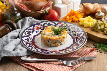 Olivier salad - a traditional Russian salad of vegetables, sausage and mayonnaise