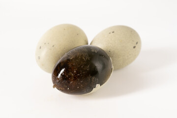 Songhua Eggs with Chinese Specialty Ingredients on White Background