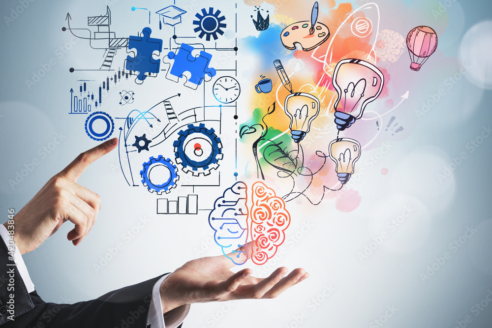 Wall mural man hand touch brain sketch with two different sides of thinking