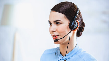 portrait of smiling call center operator in headset