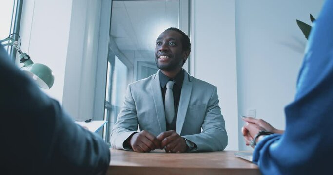 African business man smiling during job interview