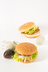 Chinese characteristic preserved egg burgers on a solid background