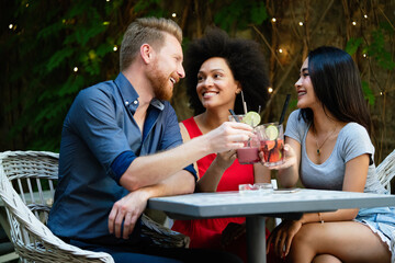 Group of friends having fun together. People talking laughing and enjoying their time