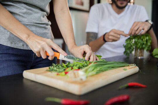 Couple at home preparing lunch together