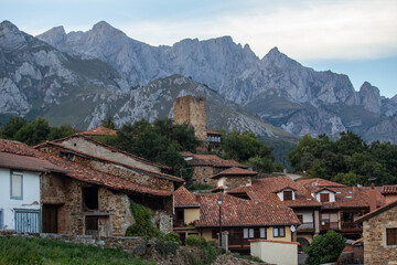 traditional Spanish mountain village with traditional stone houses and a tower