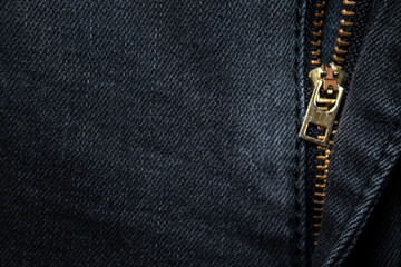 Denim with zipper. Background on the theme of denim clothing.