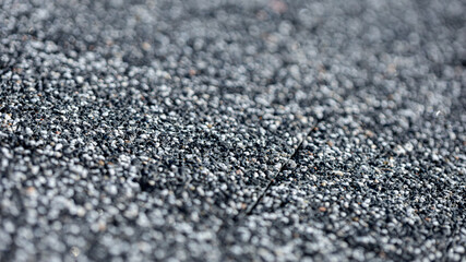 Concrete texture, gray porous tiles, close-up selected focus 