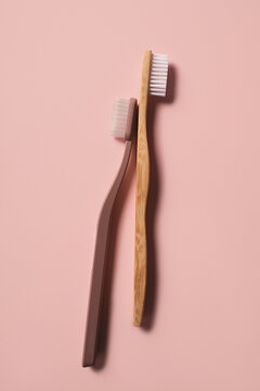Eco / environmentally friendly products - toothbrushes on pink background