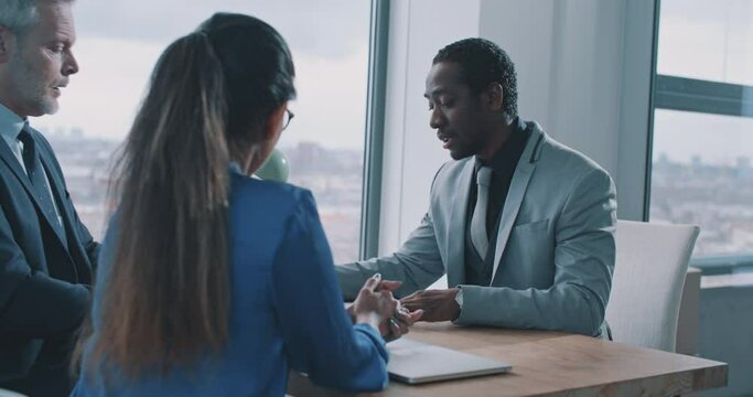 African ethnicity man applicant successfully pass job interview getting hired at new job