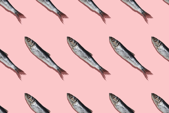 Diagonal pattern of Baltic Herring on a Pink colorbackground