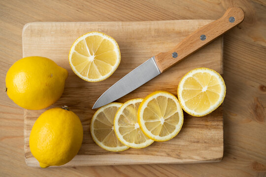 lemons cut open on a cutting board