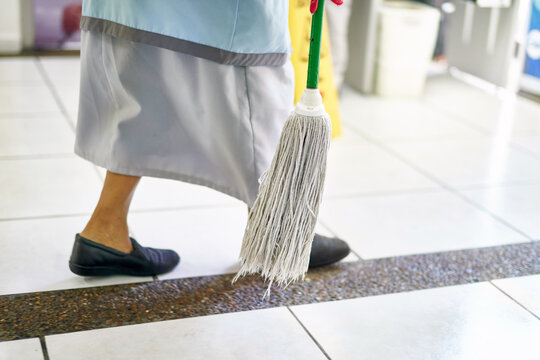 Concept photo of a cleaning lady in an official building
