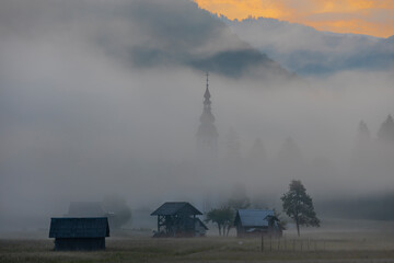 morning fog in river valley Sava Bohinjka, Slovenia