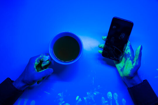 Infected person touched surfaces under fluorescent light