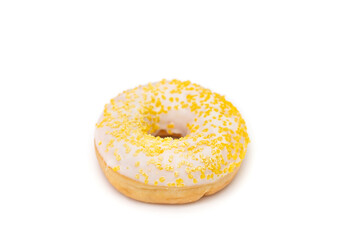Donut with white sugar glazed and sprinkled with yellow pastry crumbs, on a isolated background with copy space